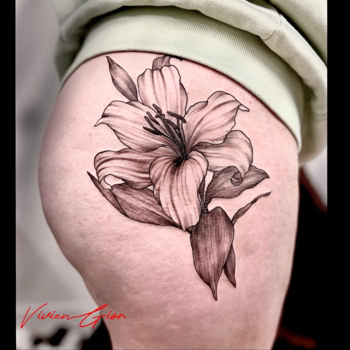  realistic tattoo of a rose tattooed on the womans butt 