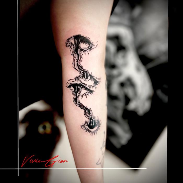  realistic tattoo of a fantasy plant growing from the bottom all the way to the ceeling breaking it