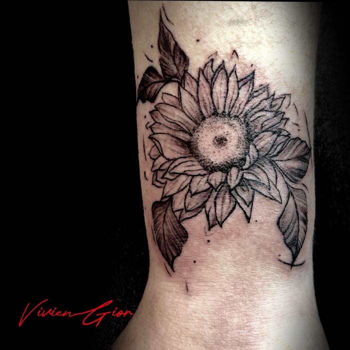  realistic tattoo of a flower on hand 