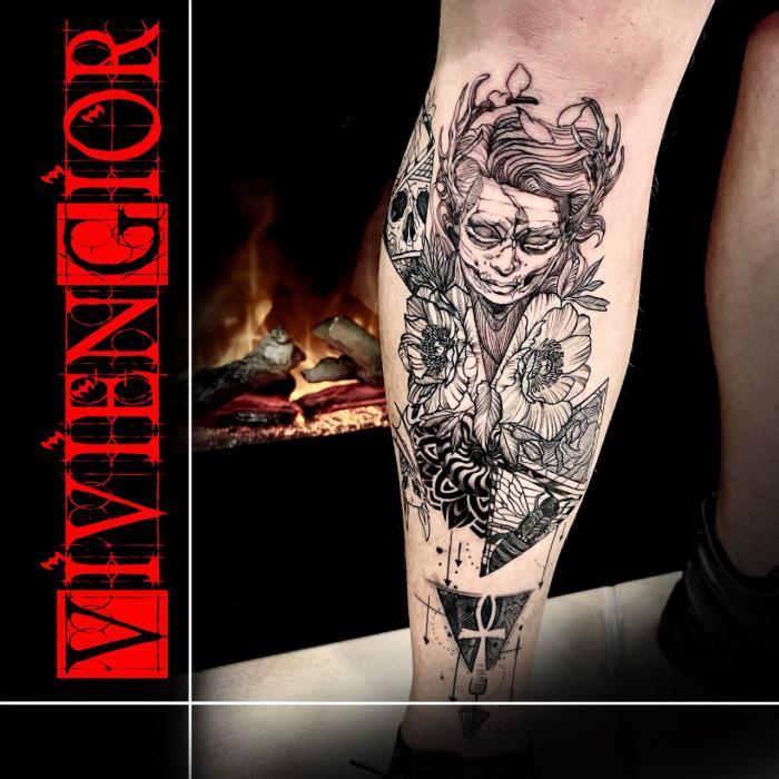 tattoo of a human near a skull in black and white on hand 