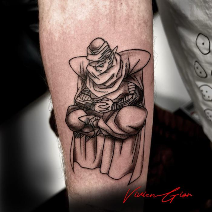  tattoo of anime character from anime dragon ball z on hand sitting sad