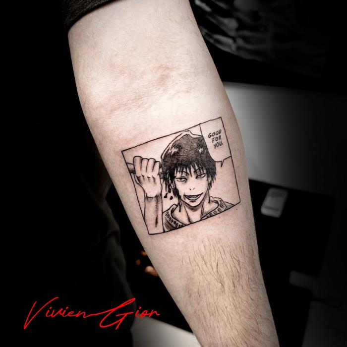  tattoo of anime character saying good for you with menancing smile while looking at the camera smiling 